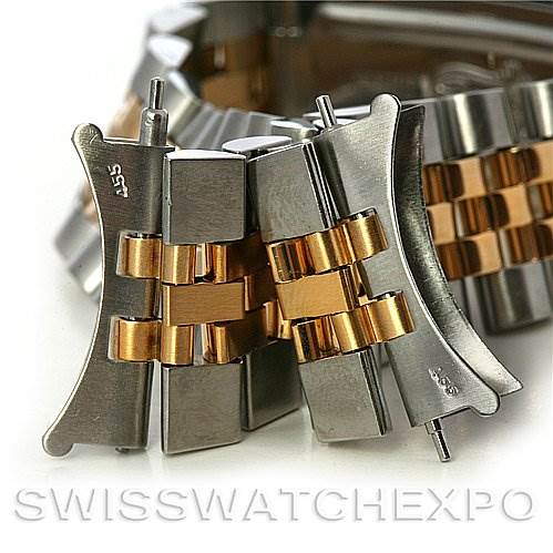 This close-up image shows the bracelet links of a Vintage Collection Rolex watch, highlighting the two-tone metal finish.
