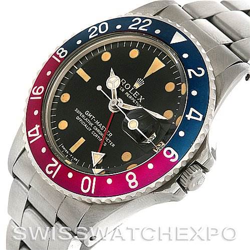 The image shows a side-angle view of a Vintage Collection Rolex GMT-Master watch, highlighting the bezel, dial, and bracelet.