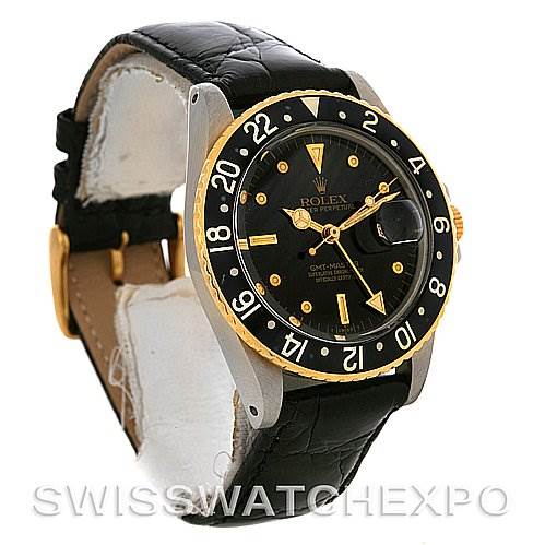 The image shows a side-angle view of a Rolex Vintage Collection 1675 Men's Stainless Steel Black Dial 1675 Men's Stainless Steel Black Dial watch featuring its black dial, bezel, and leather strap.