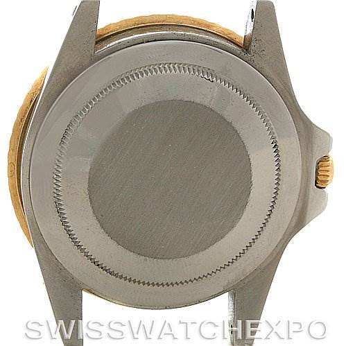 The image shows the back case and crown of a Vintage Collection model by Rolex from a straight-on angle.