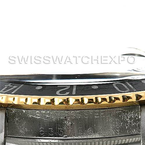 This image shows a close-up of the bezel, dial, and case of a Rolex Vintage Collection 1675 Men's Stainless Steel Black Dial 1675 Men's Stainless Steel Black Dial watch.