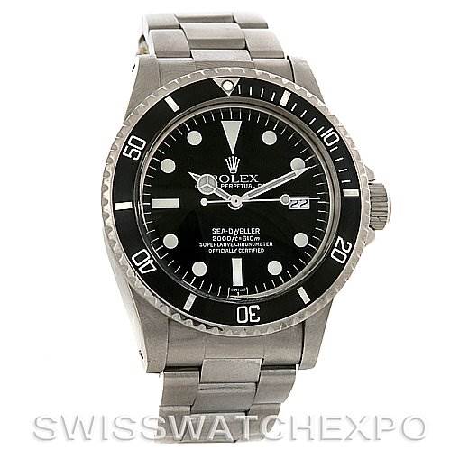 The image shows a front view of the Rolex Vintage Collection 1665 Men's Stainless Steel  1665 Men's Stainless Steel  Sea-Dweller watch, displaying its black dial, bezel, and metal bracelet.