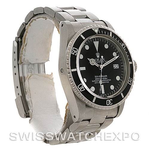 This image shows a side and front angle view of a Rolex Vintage Collection 1665 Men's Stainless Steel  1665 Men's Stainless Steel  watch, featuring its bezel, dial, and metal bracelet.