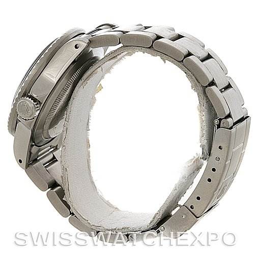 The image shows the side view of the Vintage Collection model by Rolex, highlighting the case, crown, and metal bracelet.