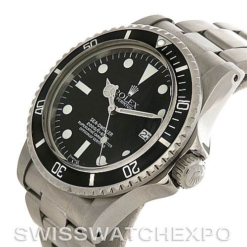 The image shows a side-angle view of a Vintage Collection Rolex Sea-Dweller watch, highlighting the bezel, crown, bracelet, and dial.