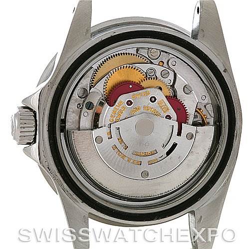 The image shows the back view of a Rolex Vintage Collection 1665 Men's Stainless Steel  1665 Men's Stainless Steel  watch, focusing on its exposed internal mechanics and gears.