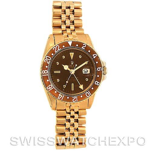 This is a front view of a Rolex Vintage Collection 1675 Men's Yellow Gold Brown Dial 1675 Men's Yellow Gold Brown Dial watch showing the face, bezel, and band in detail.