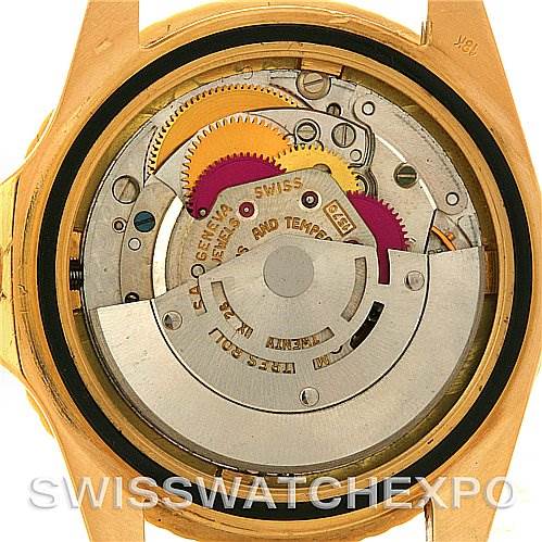 This is a close-up view of the movement inside a Rolex Vintage Collection 1675 Men's Yellow Gold Brown Dial 1675 Men's Yellow Gold Brown Dial watch, showing gears and internal mechanisms.