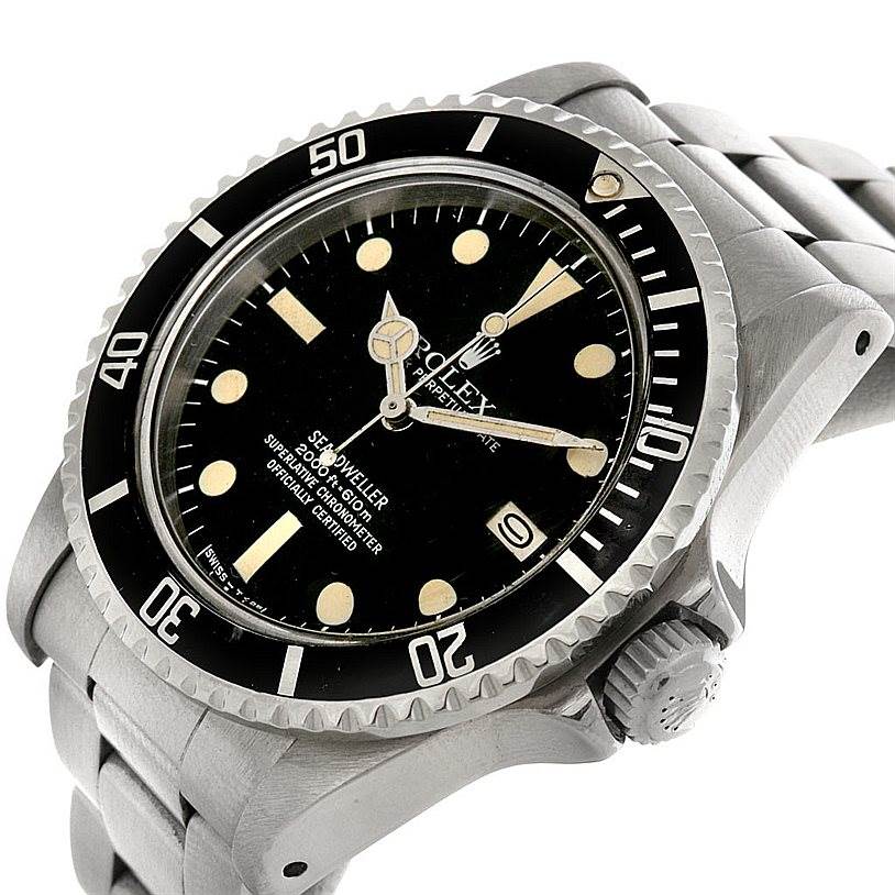 The Rolex Vintage Collection 1665 Men's Stainless Steel  1665 Men's Stainless Steel  watch is shown at an angle highlighting its face, bezel, crown, and part of the bracelet.