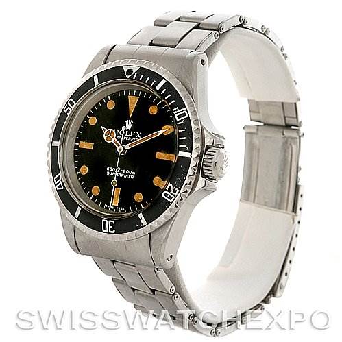The image shows a side-angle view of the Rolex Vintage Collection 5513 Men's Stainless Steel Black Dial 5513 Men's Stainless Steel Black Dial watch, highlighting the dial, bezel, crown, and bracelet.