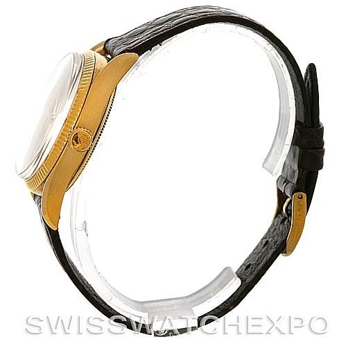 The image shows a side profile view of a Vintage Collection Rolex watch, featuring the case, crown, lugs, and leather strap.