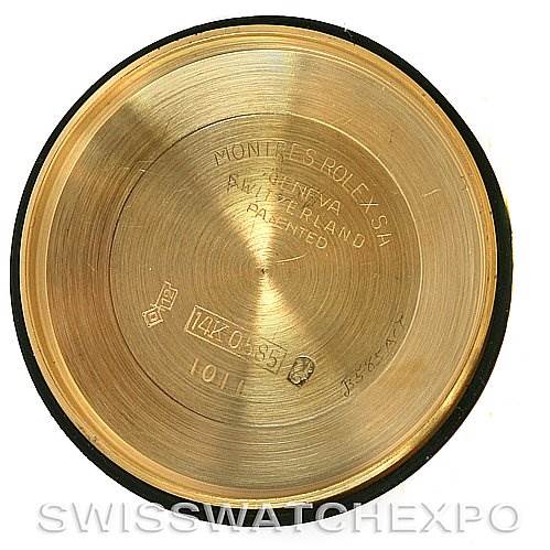 The image shows the inside case back of a Rolex Vintage Collection 1011 Men's Yellow Gold Champagne Dial 1011 Men's Yellow Gold Champagne Dial watch at a direct top-down angle.