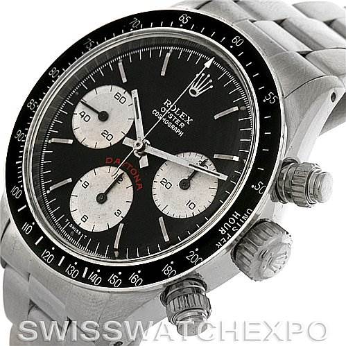 The image shows a close-up of the Rolex Vintage Collection 6263 Men
s Stainless Steel Black Dial 6263 Men
s Stainless Steel Black Dial watch from an angled side view, highlighting the dial, bezel, and crown.