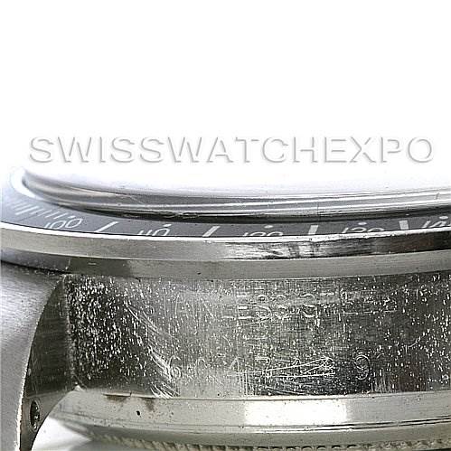The image shows a close-up of the side of the case and bezel of a Vintage Collection Rolex.