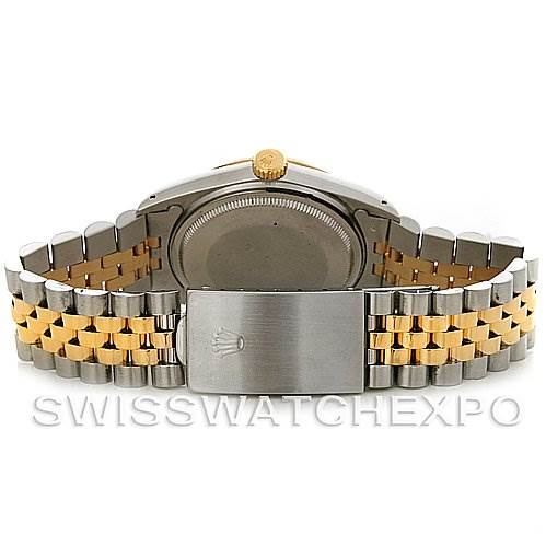 This image shows the backside of the Vintage Collection Rolex watch, highlighting the two-tone bracelet and clasp with the Rolex logo.