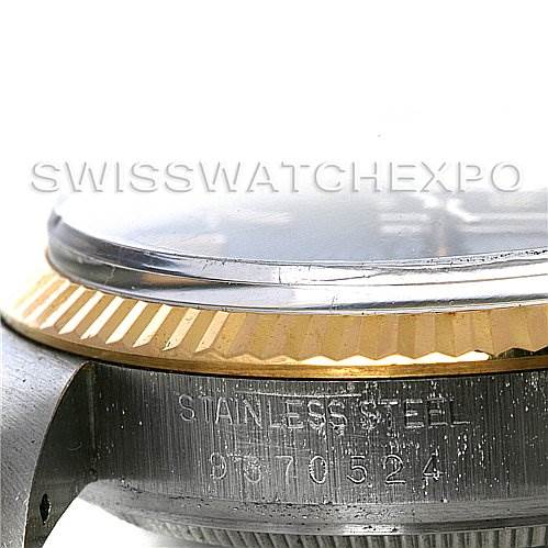 The image shows a close-up view of the case side and beveled edge of a Rolex Vintage Collection 16013 Men
s Stainless Steel Black Dial 16013 Men
s Stainless Steel Black Dial watch.
