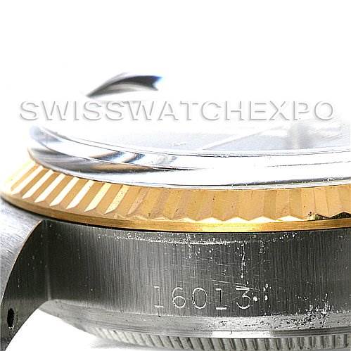 This image shows a close-up side view of the case, bezel, and crystal of a Rolex Vintage Collection 16013 Men
s Stainless Steel Black Dial 16013 Men
s Stainless Steel Black Dial model 16013.