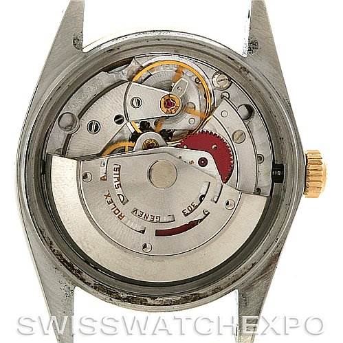 This image shows the internal mechanical movement of a Rolex Vintage Collection 16013 Men
s Stainless Steel Black Dial 16013 Men
s Stainless Steel Black Dial watch viewed from the back.