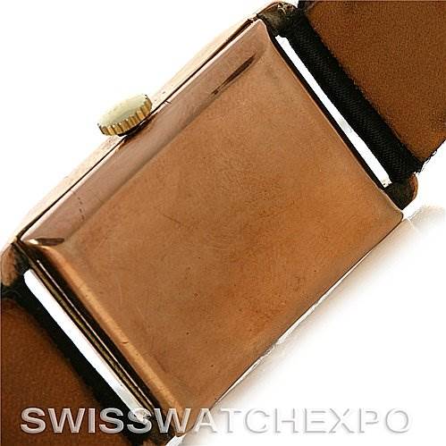 This image shows the back and side view of a Rolex Vintage Collection Men's Yellow Gold Beige Dial Men's Yellow Gold Beige Dial watch, focusing on the case and the crown.