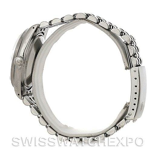 This image shows a side view of the Rolex Vintage Collection 15010 Men's Stainless Steel White Dial 15010 Men's Stainless Steel White Dial watch, highlighting the band and partially the case.