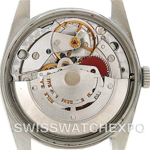 The image shows the back view of the Rolex Vintage Collection 15010 Men's Stainless Steel White Dial 15010 Men's Stainless Steel White Dial watch, highlighting its intricate internal movement mechanism.