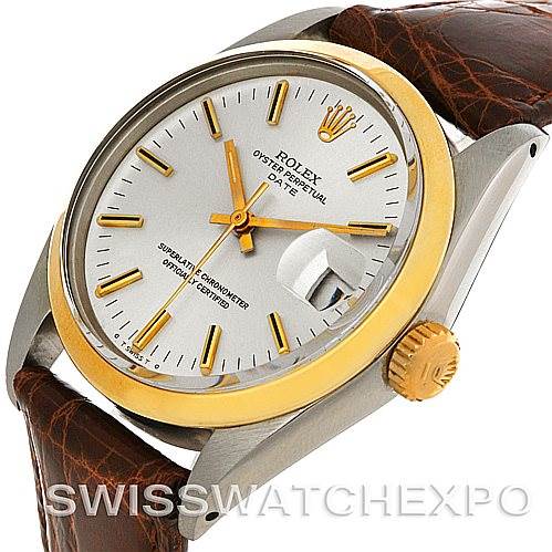 The image shows a side angle of a Rolex Vintage Collection 1500 Men's Steel and Gold (two tone) Silver Dial 1500 Men's Steel and Gold (two tone) Silver Dial watch, highlighting its dial, crown, case, and brown leather strap.