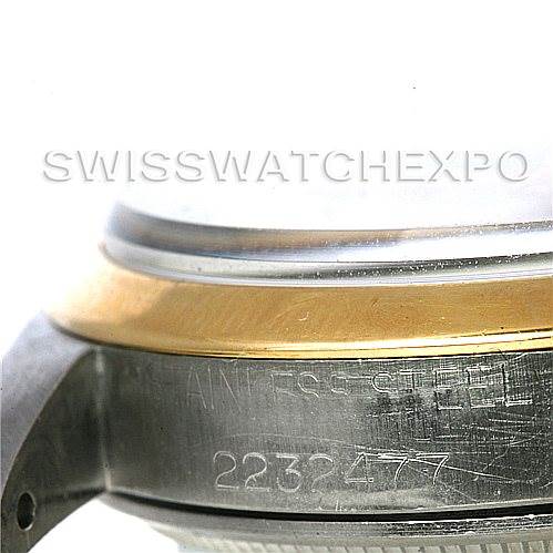 This close-up of a Rolex Vintage Collection 1500 Men's Steel and Gold (two tone) Silver Dial 1500 Men's Steel and Gold (two tone) Silver Dial watch shows the side of the stainless steel case with its serial number 2232477.