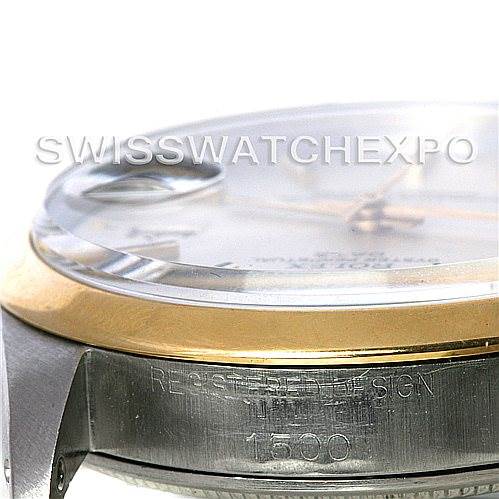 The image shows a side angle of the Rolex Vintage Collection 1500 Men's Steel and Gold (two tone) Silver Dial 1500 Men's Steel and Gold (two tone) Silver Dial watch, highlighting part of the case and bezel with "REGISTERED DESIGN 1500" engraved.