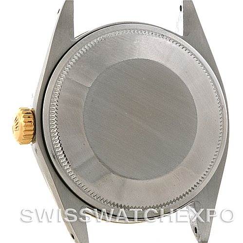 This image shows the back case of a Rolex Vintage Collection 1500 Men's Steel and Gold (two tone) Silver Dial 1500 Men's Steel and Gold (two tone) Silver Dial watch, highlighting the case back and crown.