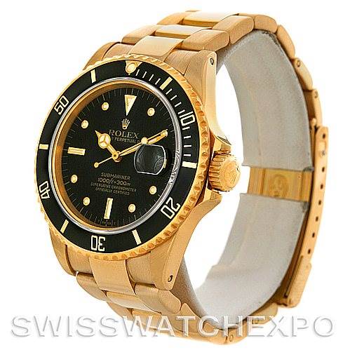 The image shows a side angle of the Rolex Vintage Collection 16808 Men's Yellow Gold Black Dial 16808 Men's Yellow Gold Black Dial Submariner, highlighting its black dial, bezel, and gold bracelet.