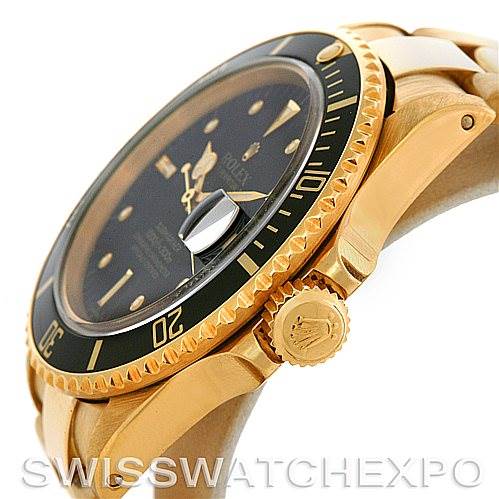 This image shows a side view of the Rolex Vintage Collection 16808 Men's Yellow Gold Black Dial 16808 Men's Yellow Gold Black Dial model, highlighting the bezel, crown, and part of the strap.