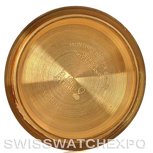 This image shows the inner side of the case back of a Rolex Vintage Collection 16808 Men's Yellow Gold Black Dial 16808 Men's Yellow Gold Black Dial watch, featuring inscriptions and hallmarks.