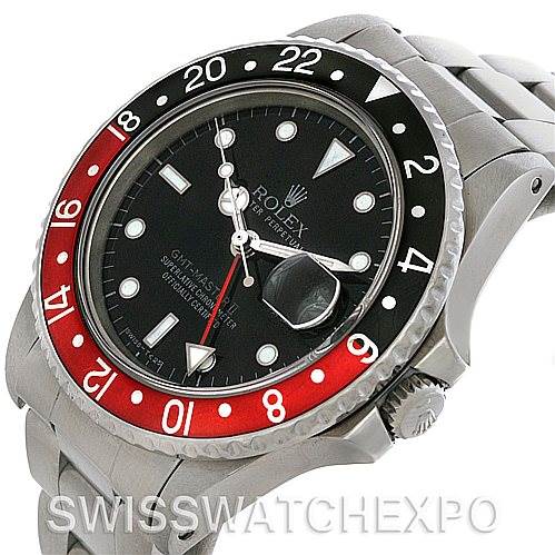 This image shows a close-up perspective of a Rolex Vintage Collection 16760 Men's Stainless Steel Black Dial 16760 Men's Stainless Steel Black Dial model, highlighting its face, bezel, and bracelet.