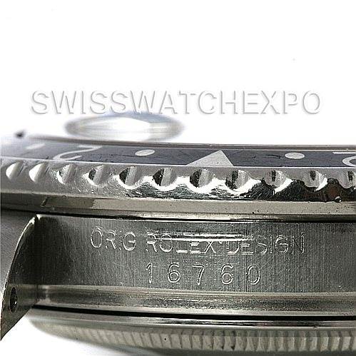 This image shows a close-up side view of the case and bezel of a Rolex Vintage Collection 16760 Men's Stainless Steel Black Dial 16760 Men's Stainless Steel Black Dial model, including the engraved serial number.
