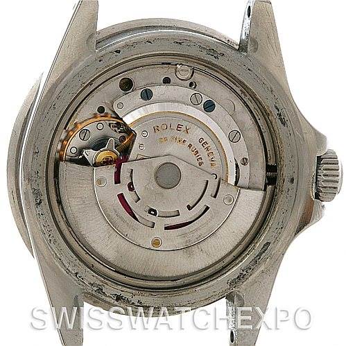 The image shows the back of a Rolex Vintage Collection 5513 Men's Stainless Steel Black Dial 5513 Men's Stainless Steel Black Dial model, displaying its intricate mechanical movement components.