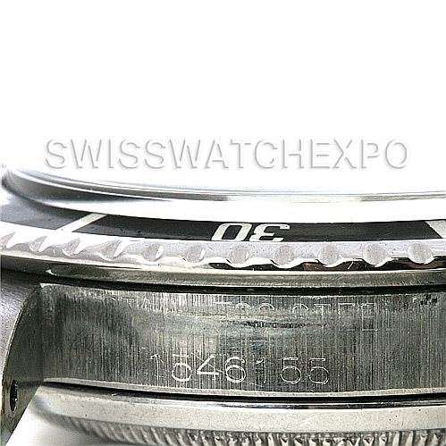 This image shows a close-up side view angle of the bezel and case of a Rolex Vintage Collection 1512 Men
s Stainless Steel  1512 Men
s Stainless Steel  watch, highlighting the engraved serial number.