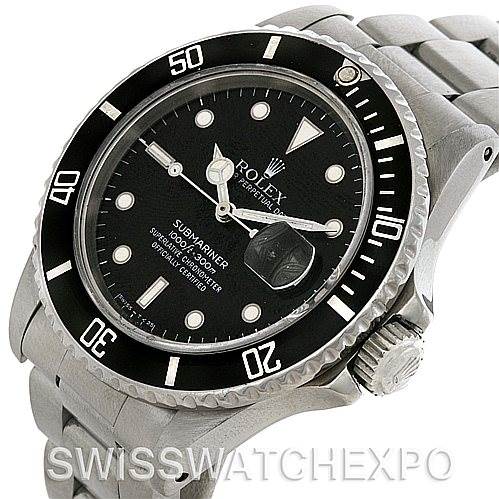 The image shows a side angle of the Vintage Collection Submariner model by Rolex, highlighting the watch face, bezel, crown, and band.
