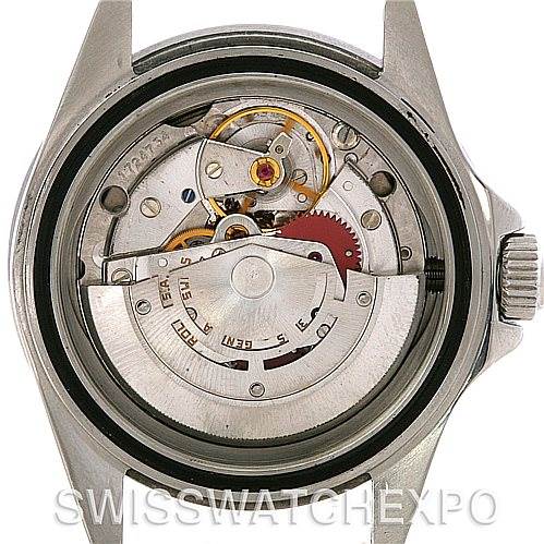 The image shows the internal mechanism of a Rolex Vintage Collection 168000 Men's Stainless Steel Black Dial 168000 Men's Stainless Steel Black Dial model watch from a back angle with its case open.