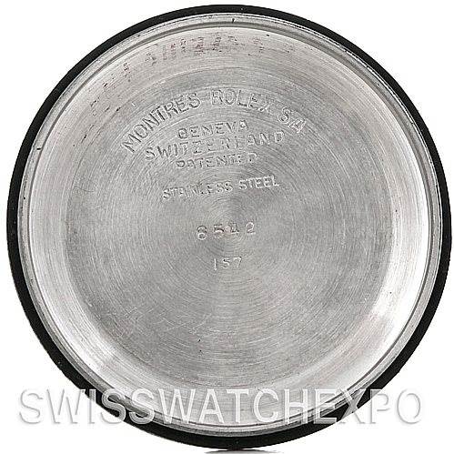 This image shows the inner case back of a Vintage Collection Rolex watch, highlighting its details and inscriptions.