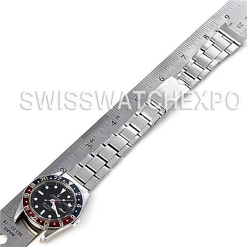 This image shows the top view of a Rolex Vintage Collection 6542 Men's Stainless Steel Black Dial 6542 Men's Stainless Steel Black Dial watch, highlighting the face, bezel, and metal bracelet.