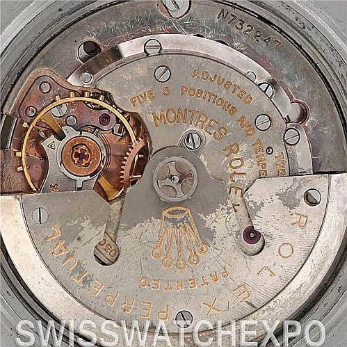 This close-up shot shows the intricate movement and mechanisms of the Rolex Vintage Collection 6542 Men's Stainless Steel Black Dial 6542 Men's Stainless Steel Black Dial watch.