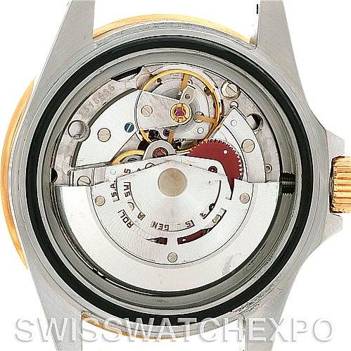 The image shows the internal movement of a Rolex Vintage Collection 16803 Men's Steel and Gold (two tone) Black Dial 16803 Men's Steel and Gold (two tone) Black Dial model watch from a back view, highlighting its mechanics.