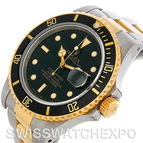This is a close-up, angled view of a Rolex Vintage Collection 16803 Men's Steel and Gold (two tone) Black Dial 16803 Men's Steel and Gold (two tone) Black Dial Submariner, showcasing the face, bezel, crown, and part of the bracelet.