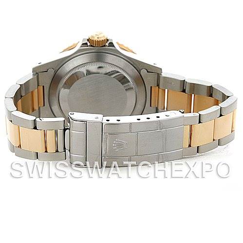 This image shows the back and bracelet clasp of a Vintage Collection Rolex watch, highlighting its two-tone metal design.