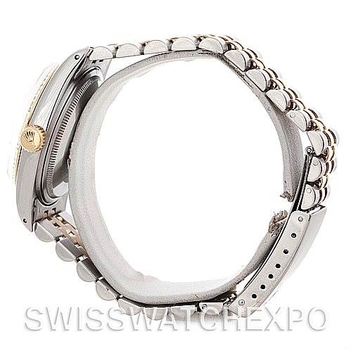 The image shows a side view of a Vintage Collection Rolex watch, highlighting the bracelet, clasp, and side of the case.