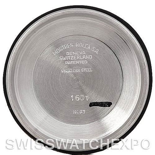 This image shows the inner side of a case back for the Rolex Vintage Collection 1601 Men's Stainless Steel Grey Dial 1601 Men's Stainless Steel Grey Dial model 1601, showcasing engravings and markings.