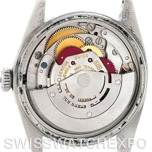 The image shows the internal mechanism of the Rolex Vintage Collection 1601 Men's Stainless Steel Grey Dial 1601 Men's Stainless Steel Grey Dial watch from a back angle with the case back removed.