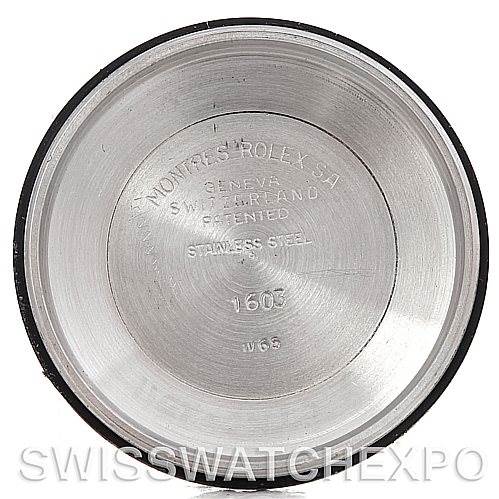 This is the inside of the back case cover for a Rolex Vintage Collection 1601 Men's Stainless Steel Silver Dial 1601 Men's Stainless Steel Silver Dial model, showing engravings with brand and model details.