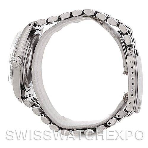 The image shows a side view of the Rolex Vintage Collection 1601 Men's Stainless Steel Silver Dial 1601 Men's Stainless Steel Silver Dial model, highlighting its strap, case, and crown.