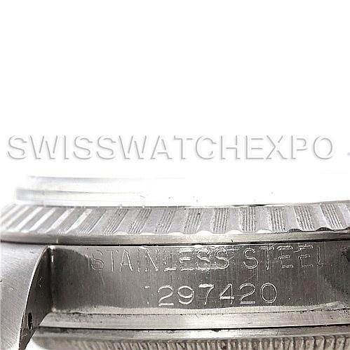 This image shows a close-up of the case side and serial number engraving on a Rolex Vintage Collection 1601 Men's Stainless Steel Silver Dial 1601 Men's Stainless Steel Silver Dial watch.